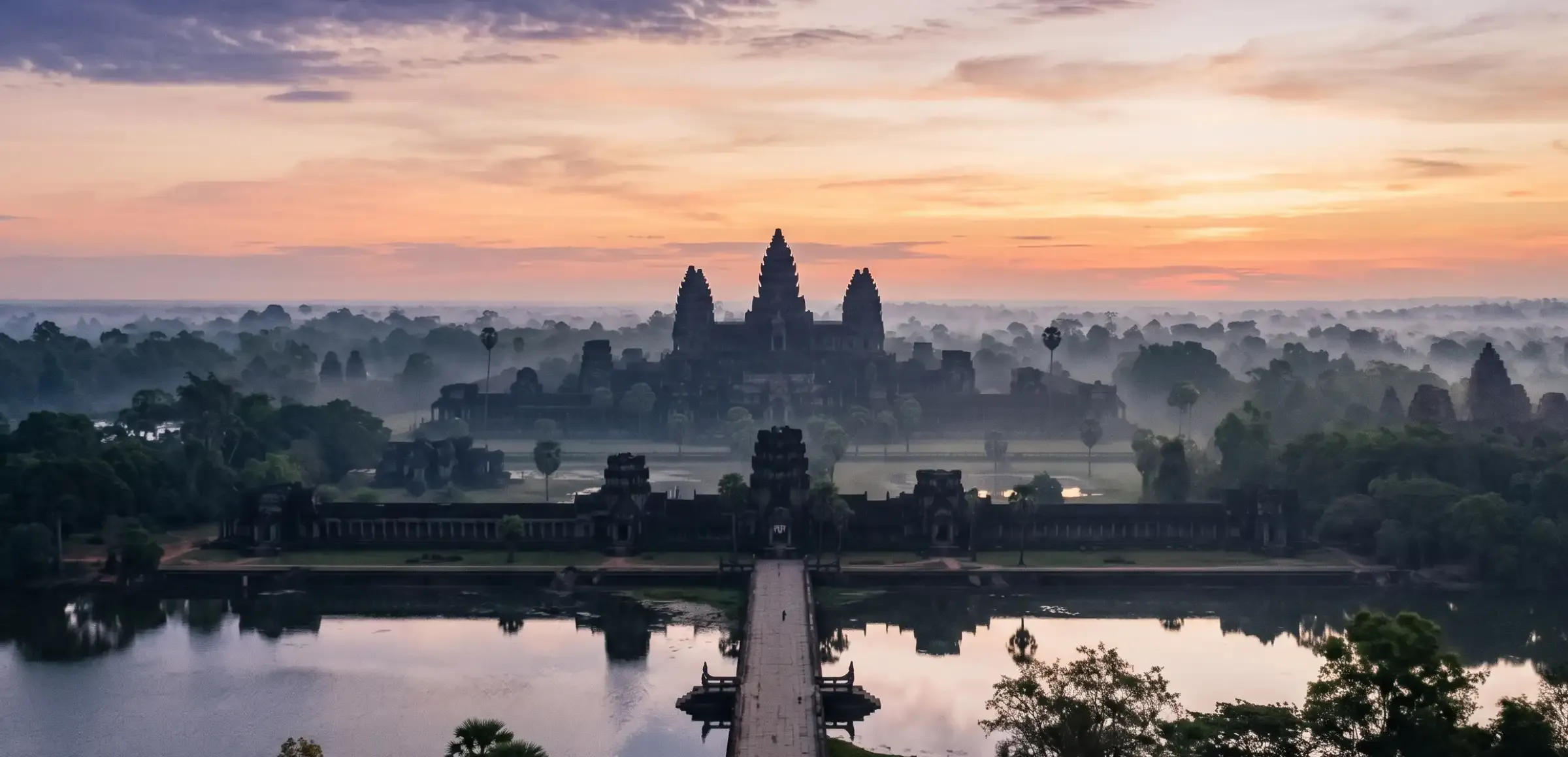 Wide view of the temples of Angkor at dawn near Siem Reap