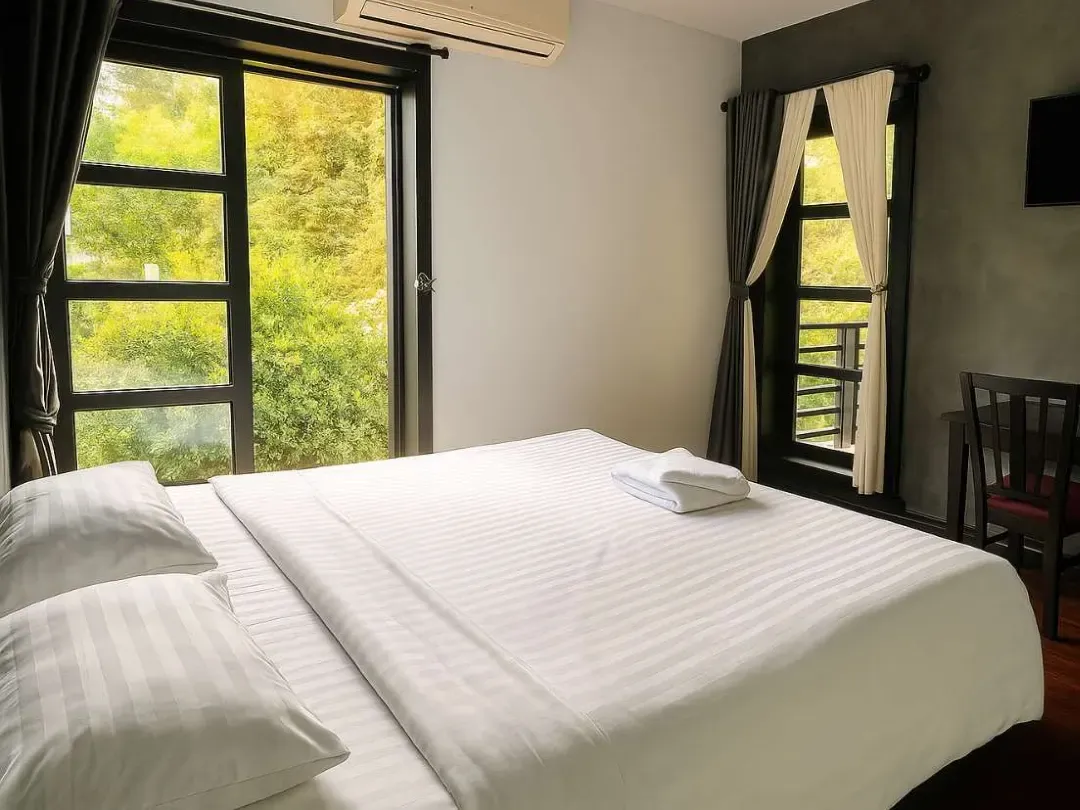 King Suite — Terrace & Pool View — Prana Hotel room in Siem Reap, photo 1