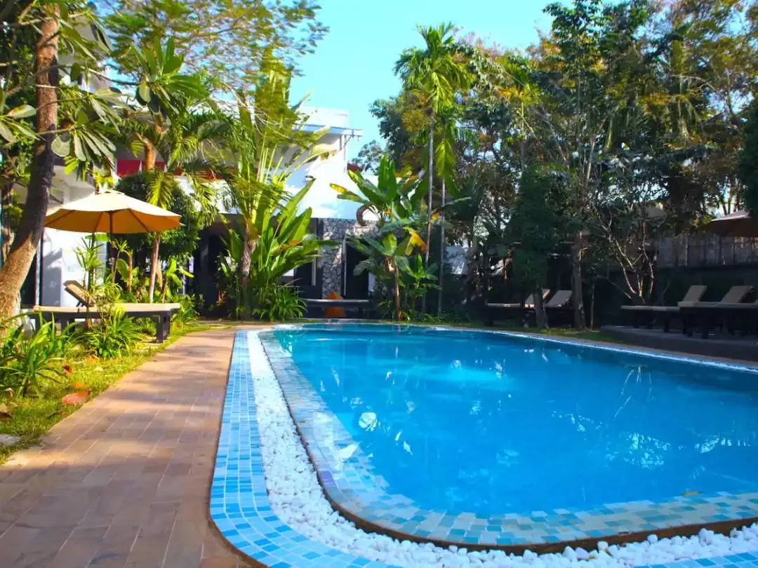 Loungers by the Prana Hotel pool in Siem Reap